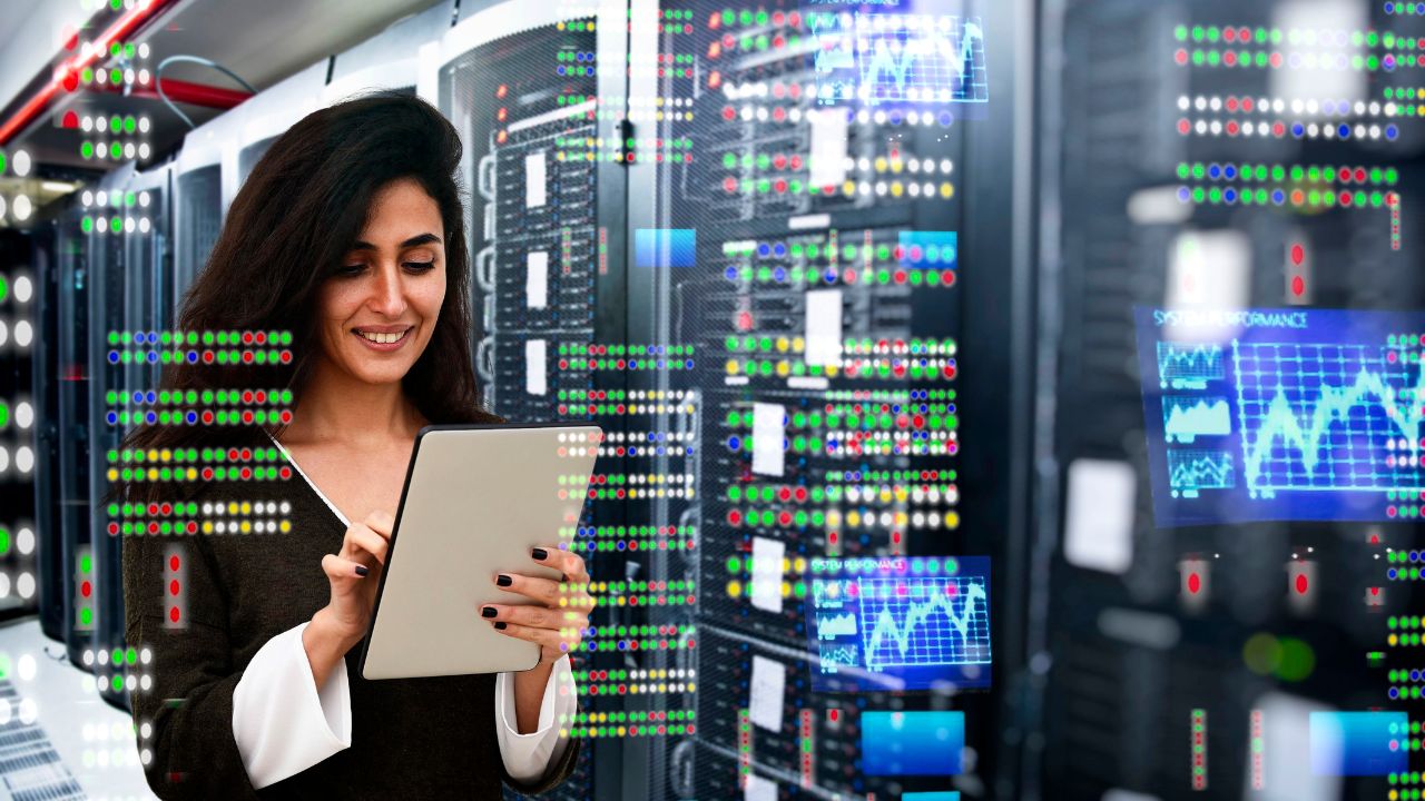 A woman working in an IT room | Scott Legal, P.C. A woman working in an IT room