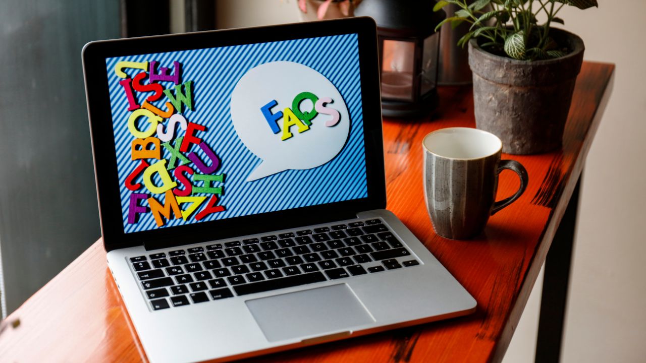 FAQ page on a laptop | Scott Legal, P.C. FAQ page on a laptop