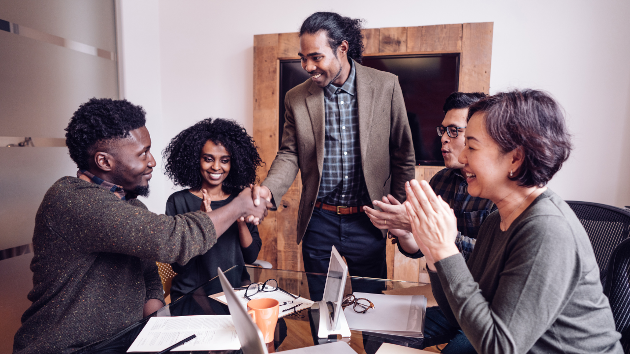 A group of people in a recruiting agency meeting in an office | Scott Legal, P.C. A group of people in a recruiting agency meeting in an office