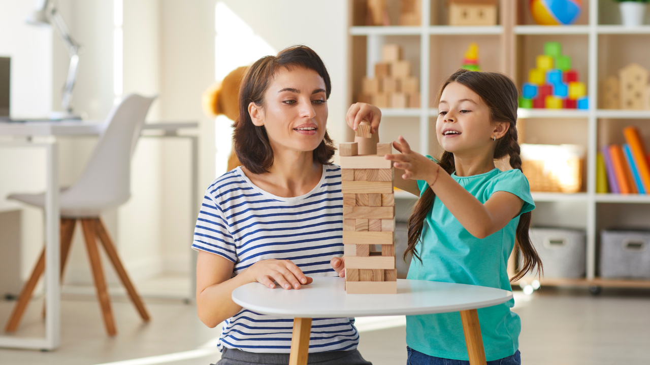 A nanny playing with a child | Scott Legal, P.C. A nanny playing with a child