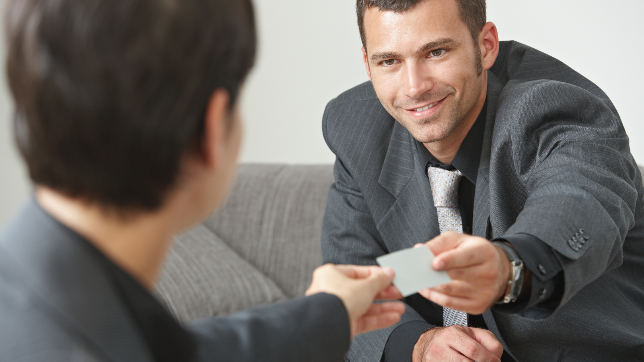 A lawyer helping a client with a change of status | Scott Legal, P.C. A lawyer helping a client with a change of status