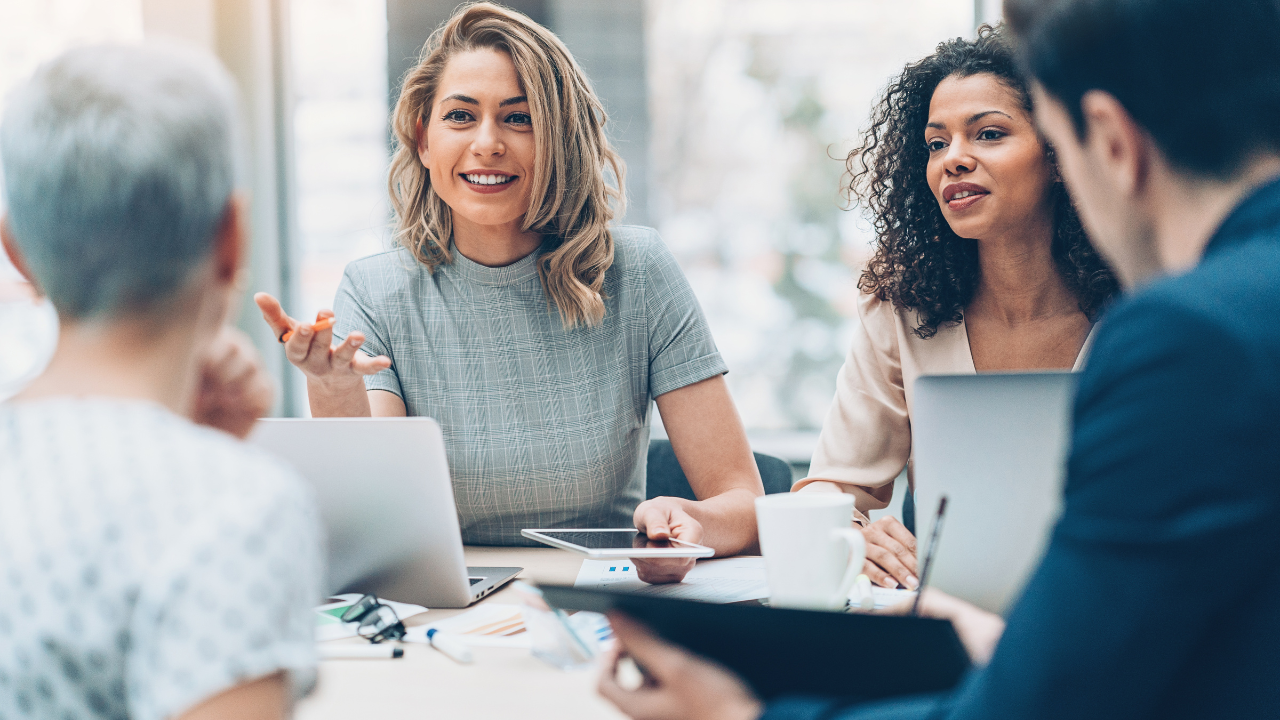 A group of executives in a meeting | Scott Legal, P.C. A group of executives in a meeting