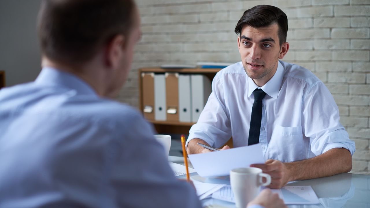 Two men in a business meeting | Scott Legal, P.C. Two men in a business meeting