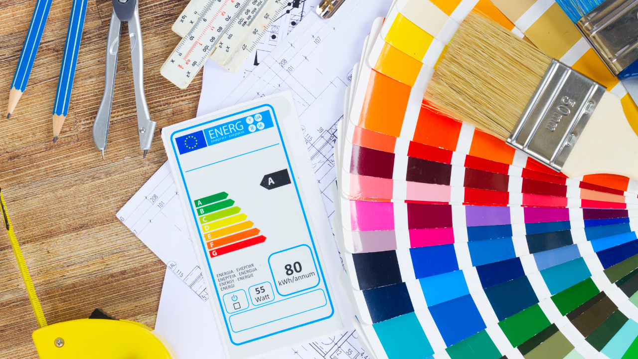 A set of design tools, paint and swatches on a table | Scott Legal, P.C. A set of design tools, paint and swatches on a table