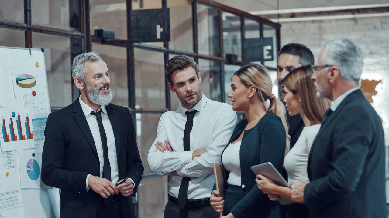A group of professionals in a meeting | Scott Legal, P.C. A group of professionals in a meeting