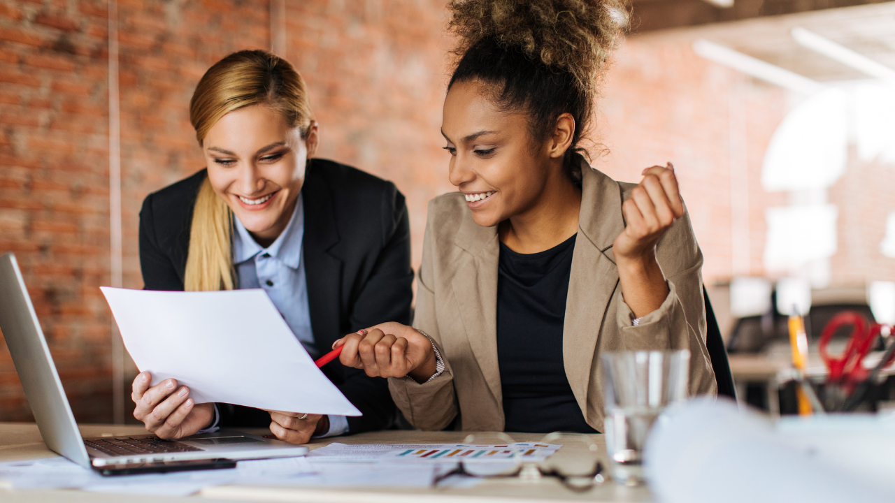 Two professionals working | Scott Legal, P.C. Two professionals working