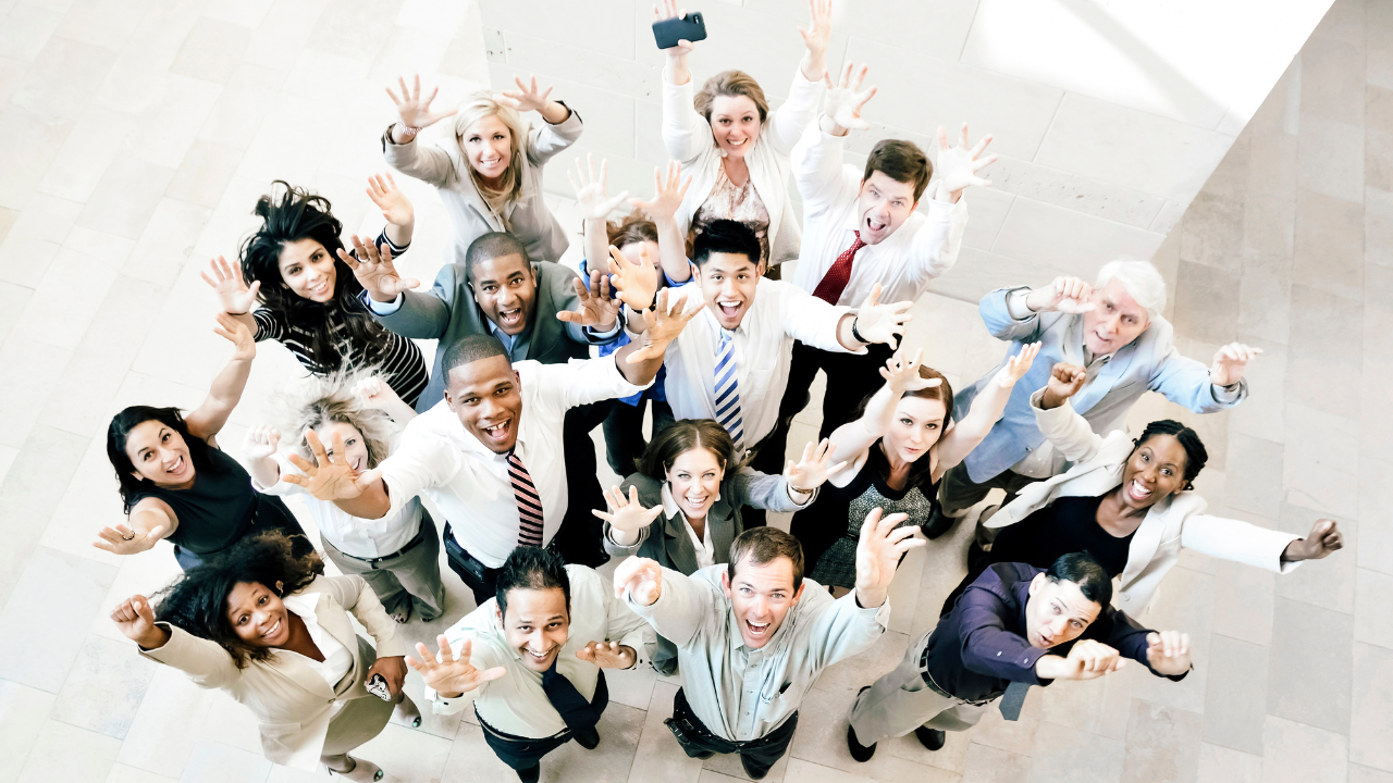 Happy office team celebrating a win | Scott Legal, P.C. Happy office team celebrating a win