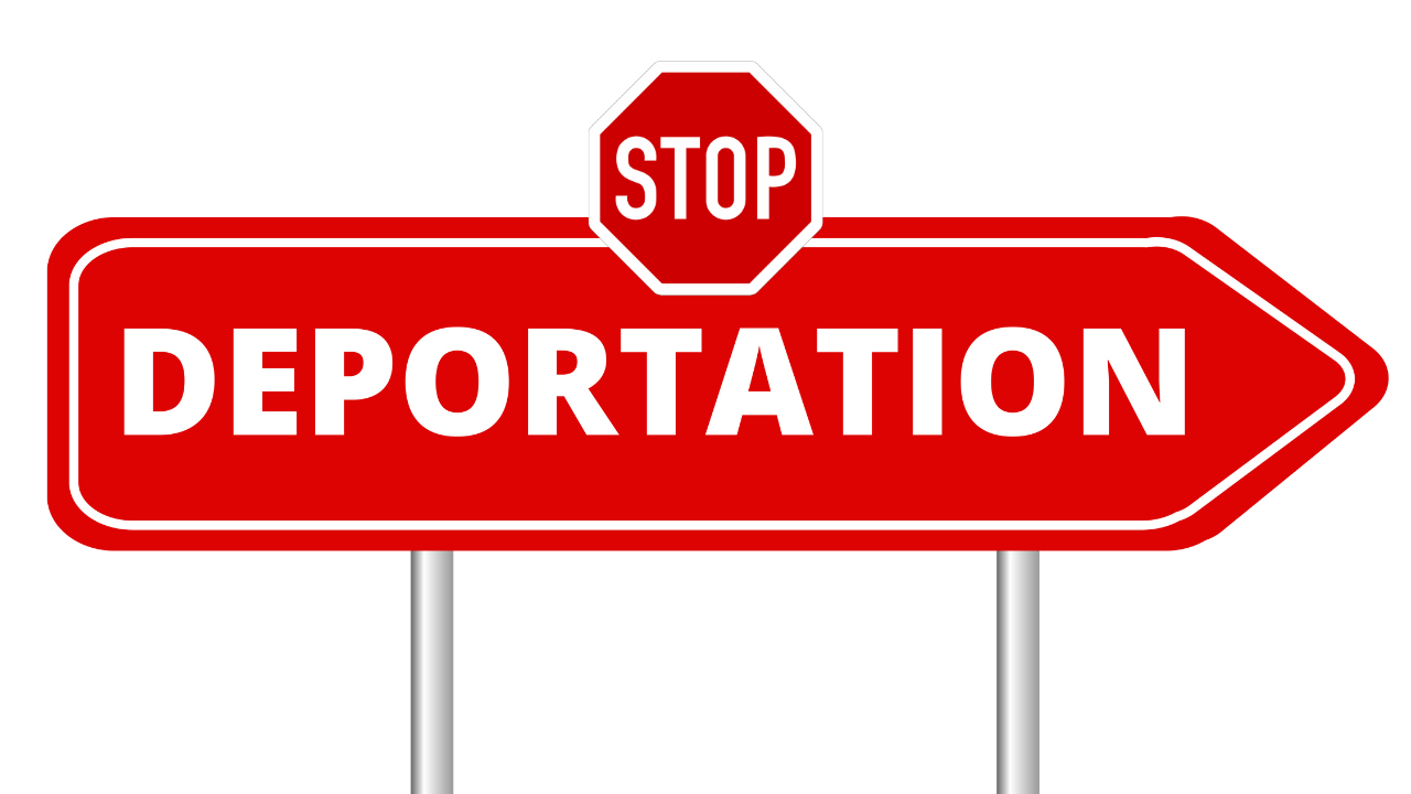 A stop deportation sign | Scott Legal, P.C. A stop deportation sign