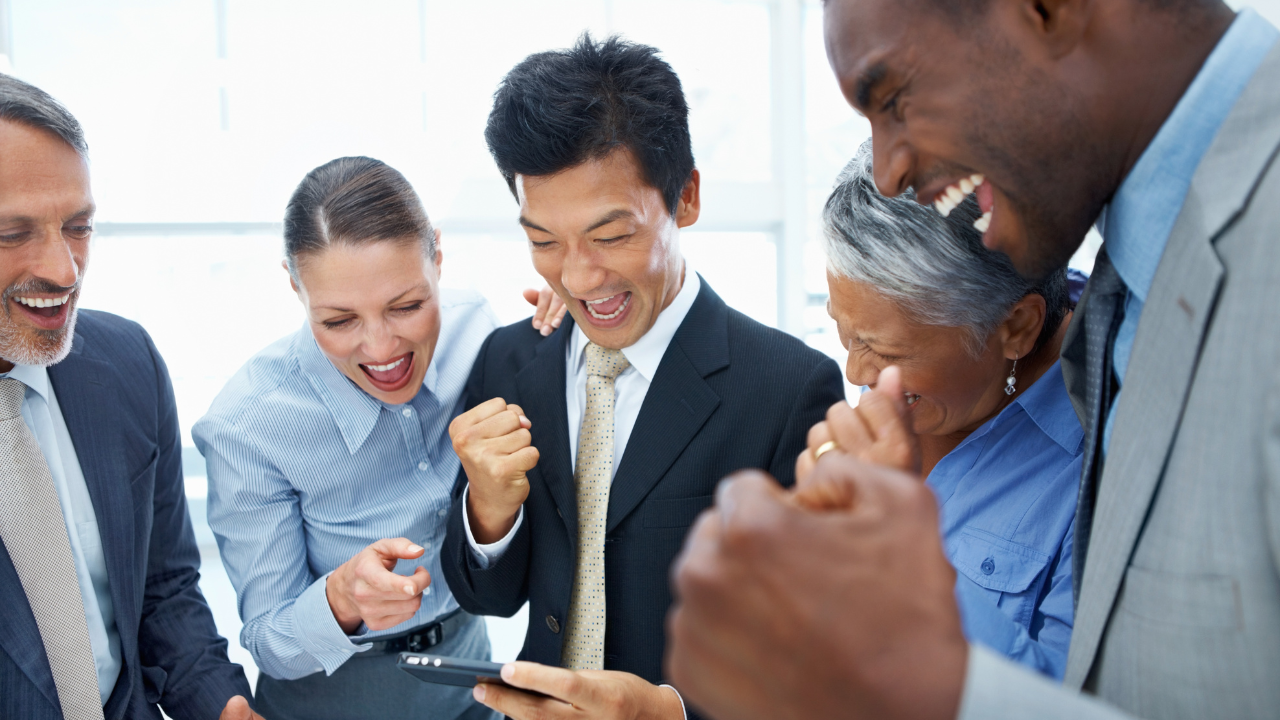 A group celebrating a big win | Scott Legal, P.C. A group celebrating a big win