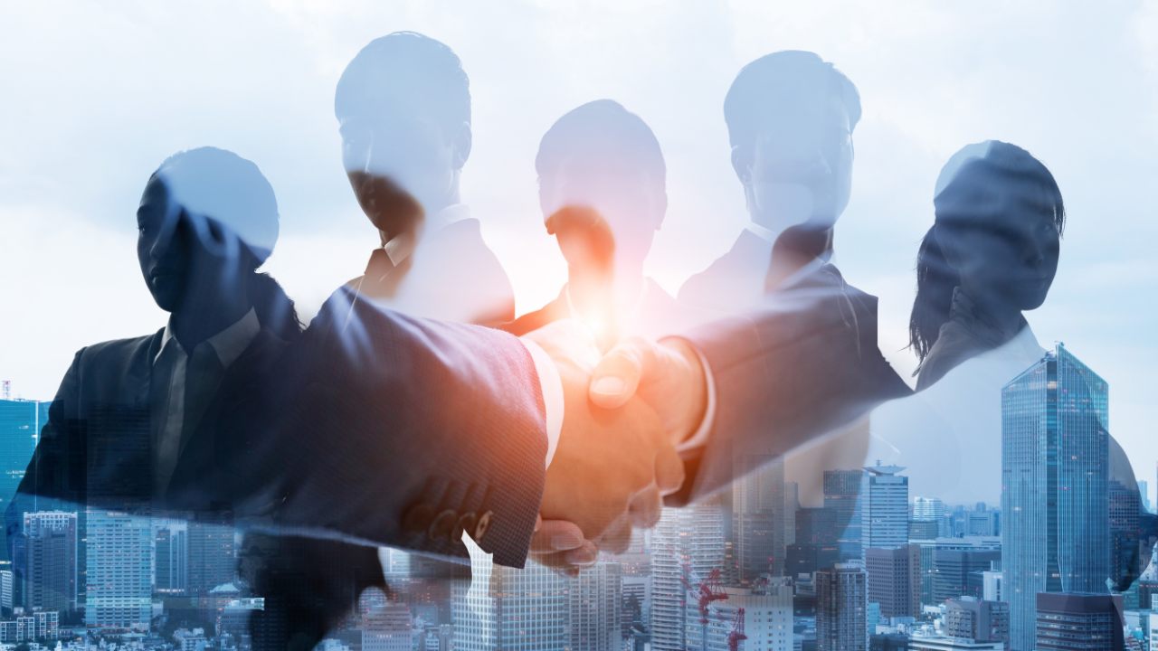 | Scott Legal, P.C. A groups of entrepreneurs shaking hands