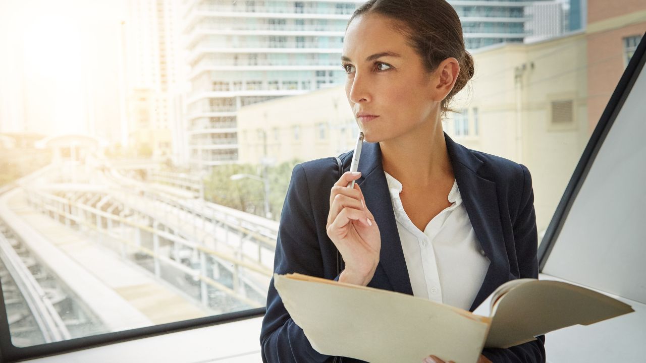 A woman considering her options | Scott Legal, P.C. A woman considering her options