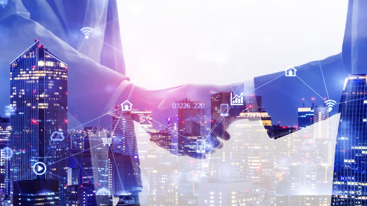 Business partners shaking hands | Scott Legal, P.C. Business partners shaking hands