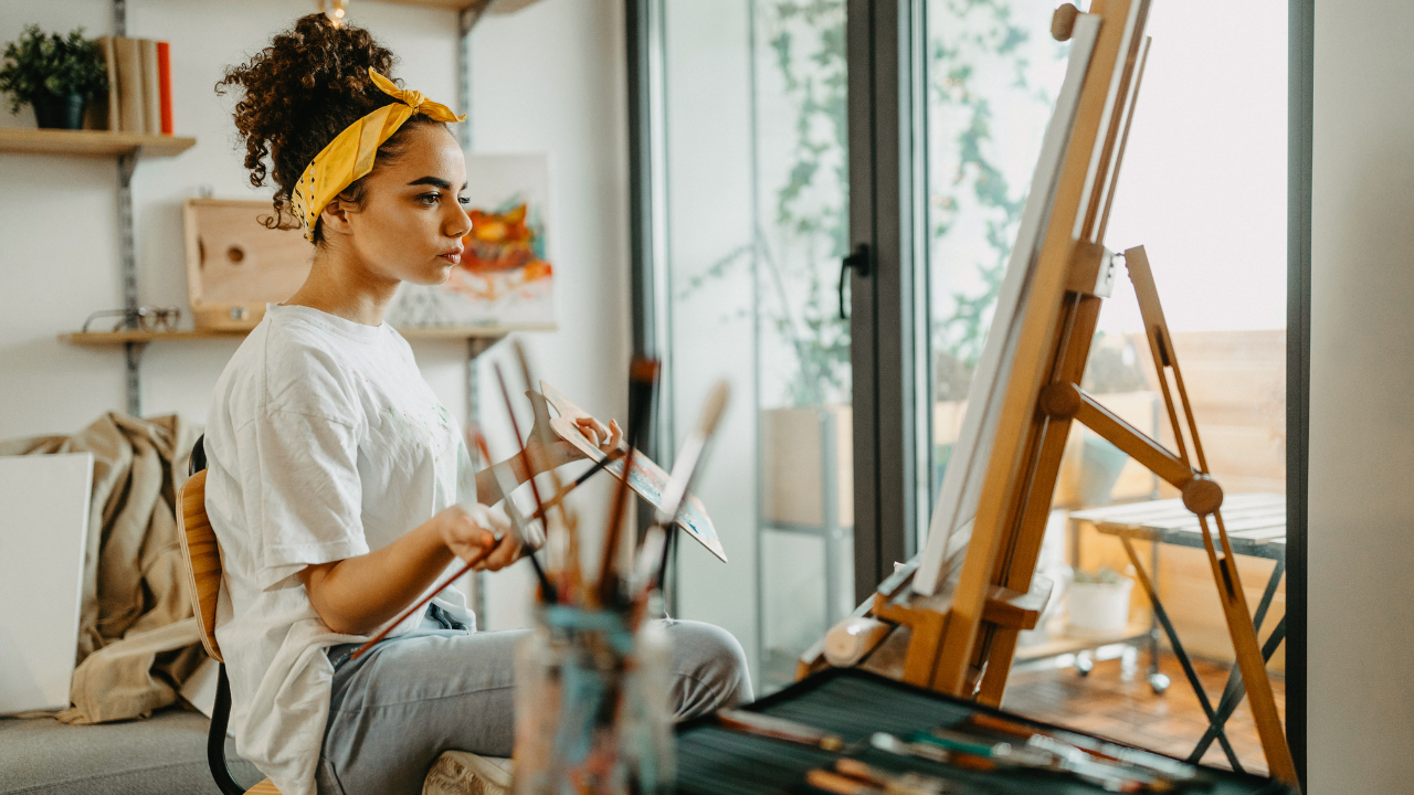 An artist painting | Scott Legal, P.C. An artist painting