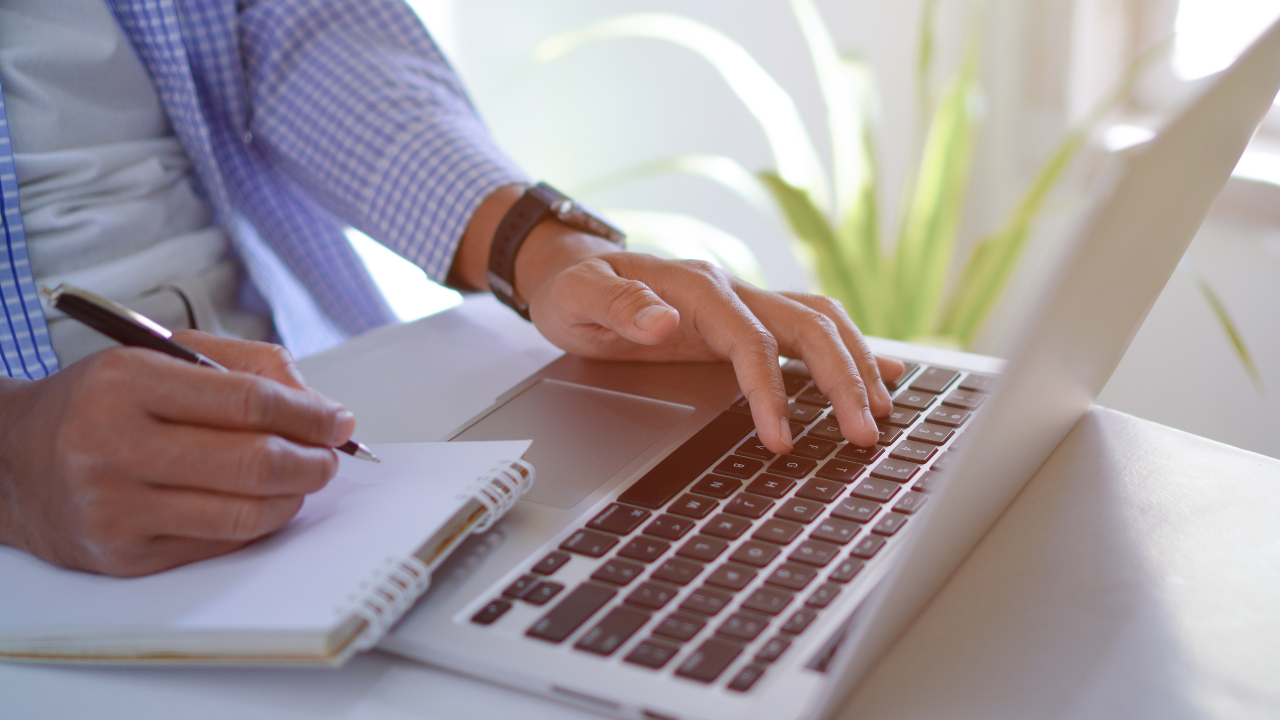 A man working on his laptop | Scott Legal, P.C. A man working on his laptop