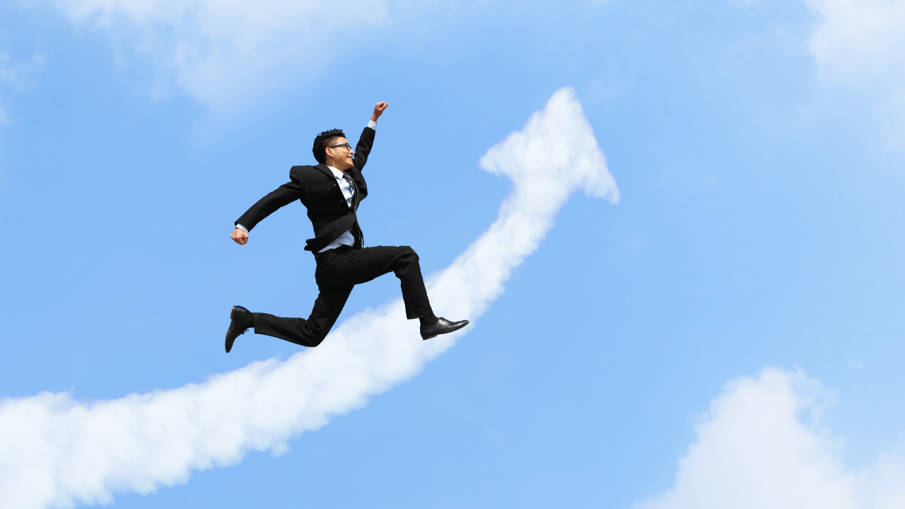 a business man celebrating success | Scott Legal, P.C. a business man celebrating success
