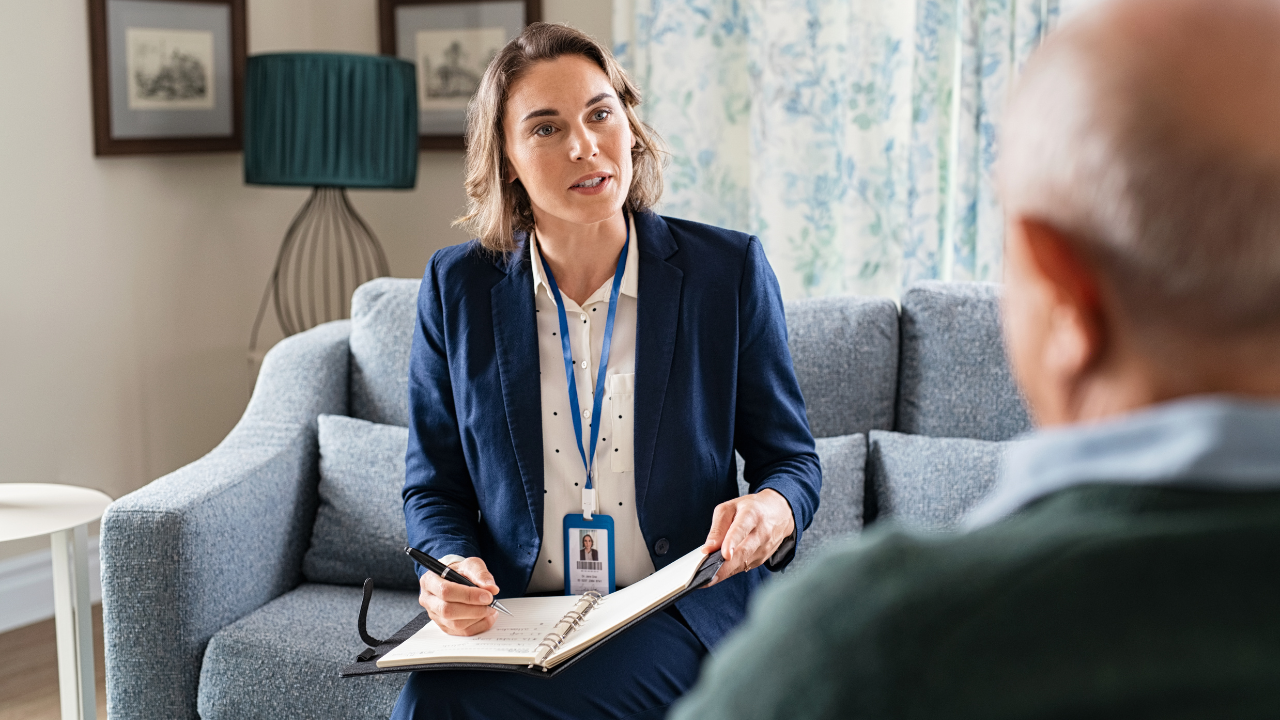 A social worker working with a patient | Scott Legal, P.C. A social worker working with a patient