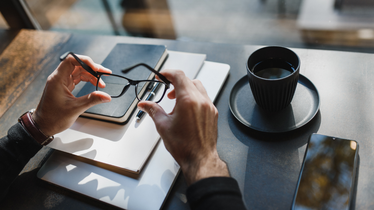 An entrepreneur working at a desk. | Scott Legal, P.C. An entrepreneur working at a desk.