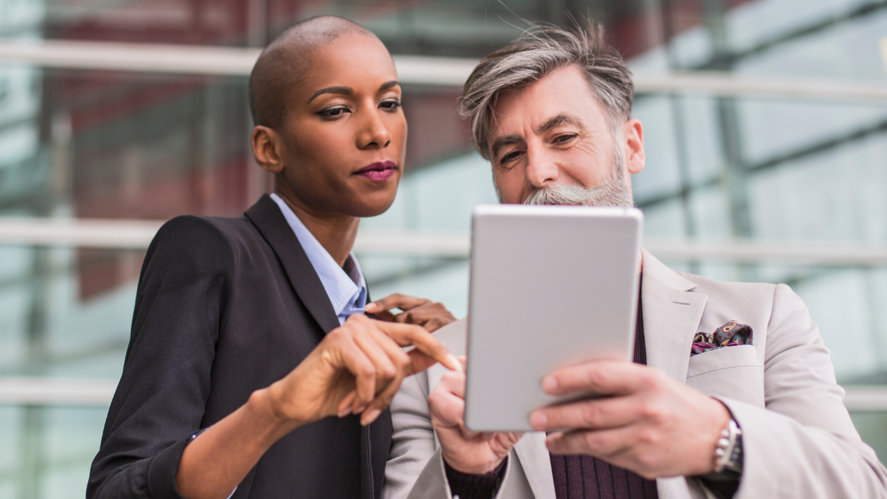 Two business professionals | Scott Legal, P.C. Two business professionals