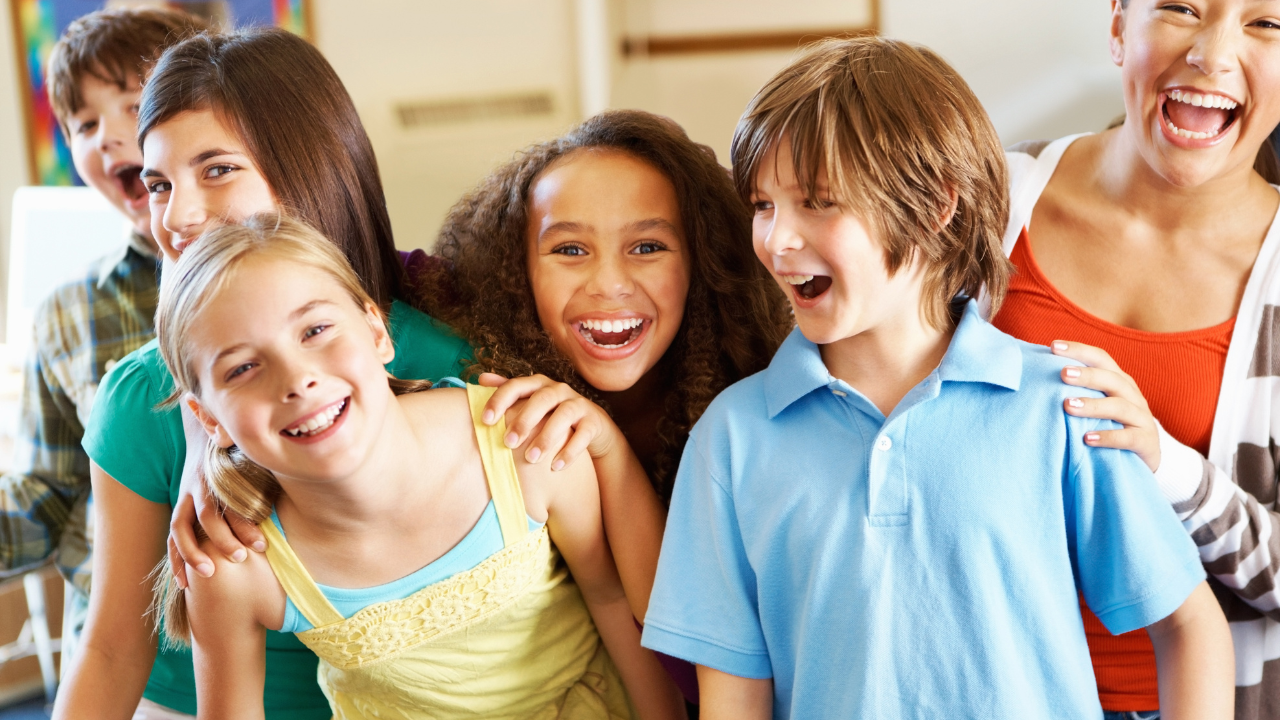 happy children in a classroom | Scott Legal, P.C. happy children in a classroom