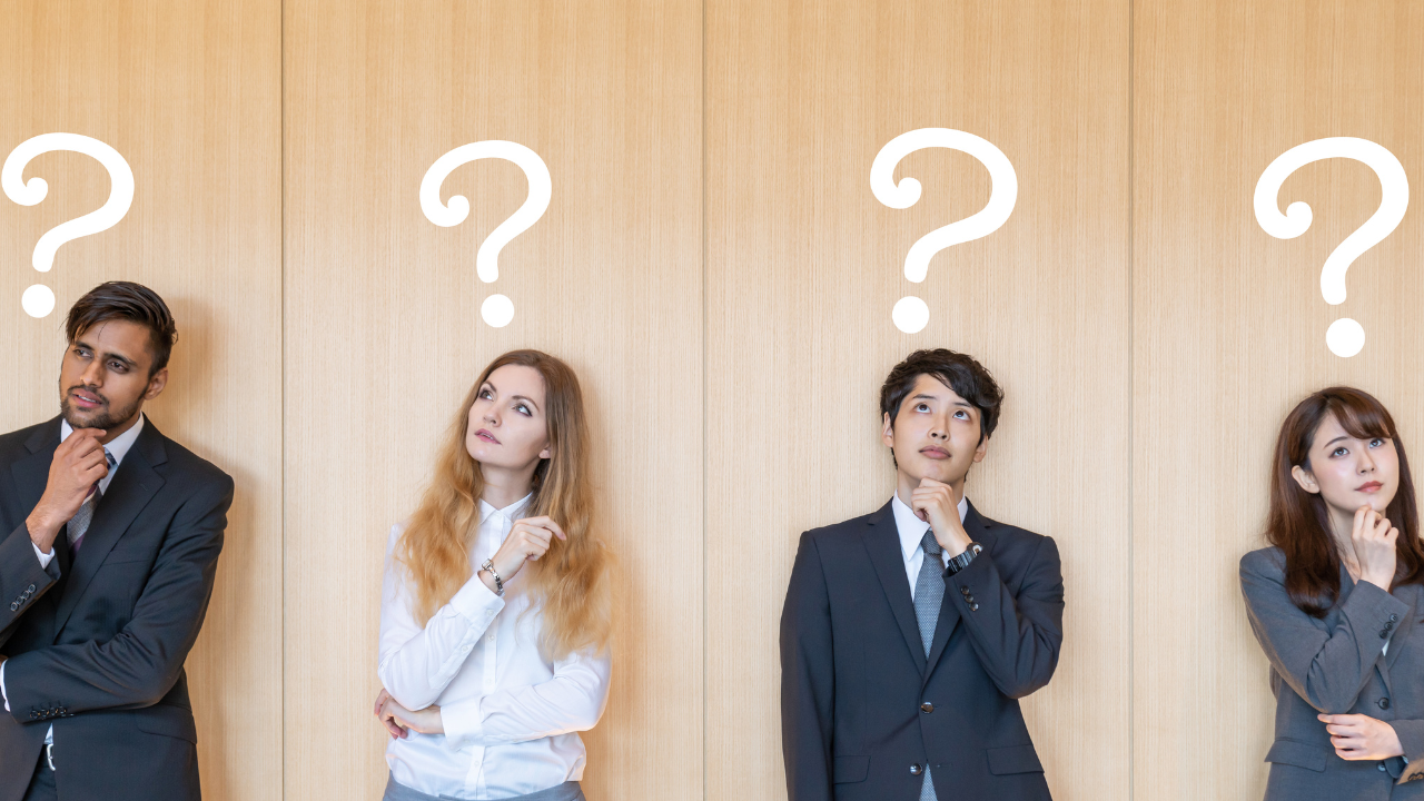 A team of business professionals thinking | Scott Legal, P.C. A team of business professionals thinking