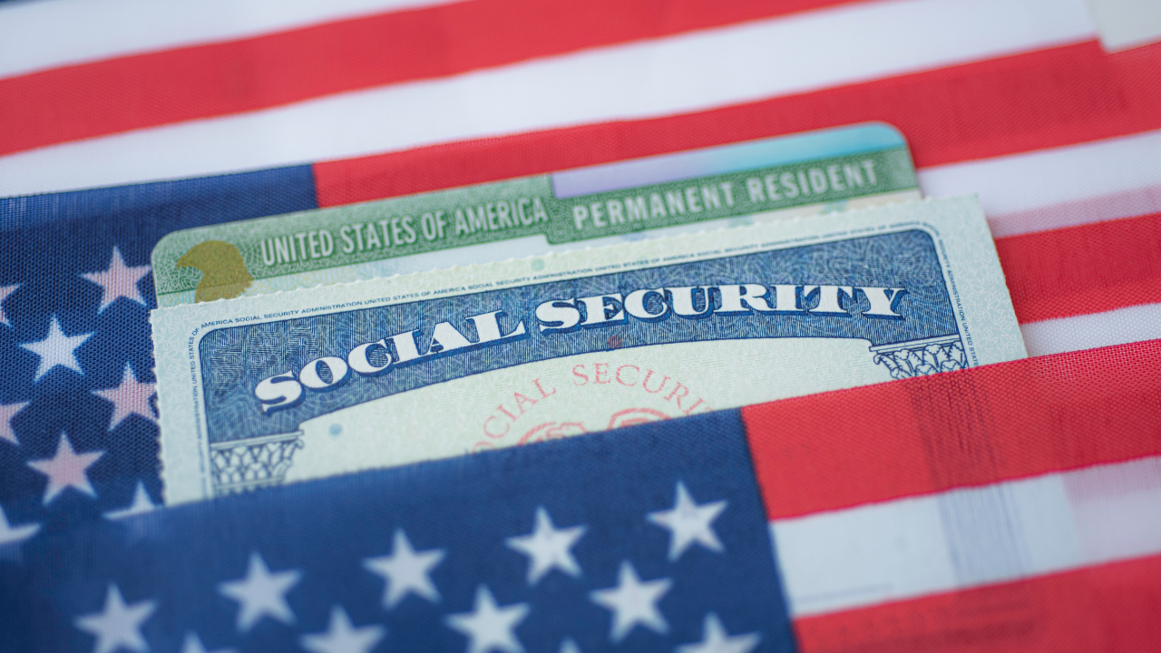 Green Card and US flag | Scott Legal, P.C. Green Card and US flag