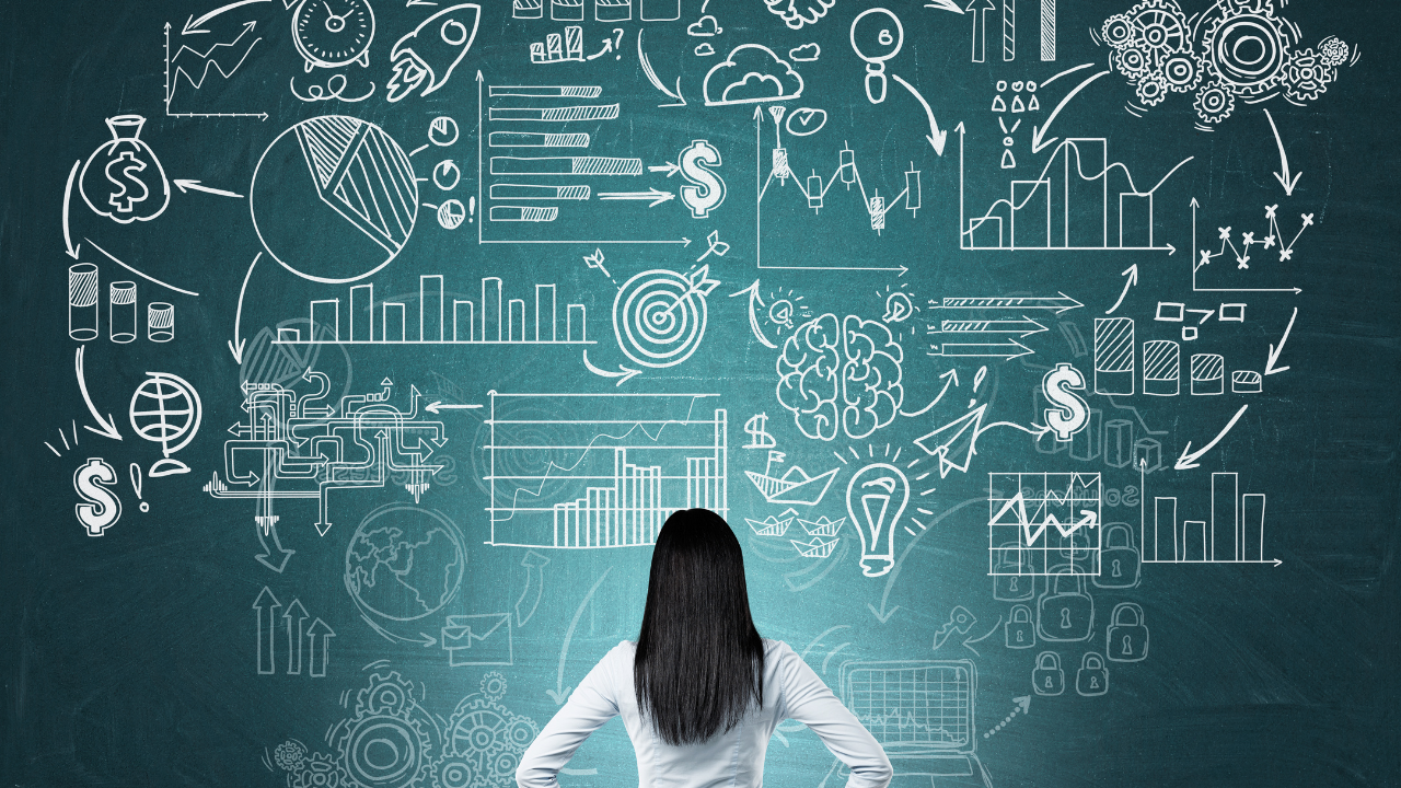 A business woman standing in font of a though board | Scott Legal, P.C. A business woman standing in font of a though board