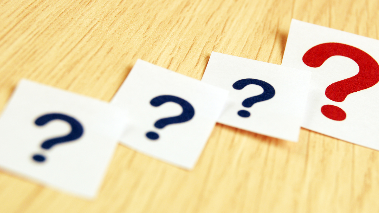 Question marks aligned diagonally across page | Scott Legal, P.C. Question marks aligned diagonally across page