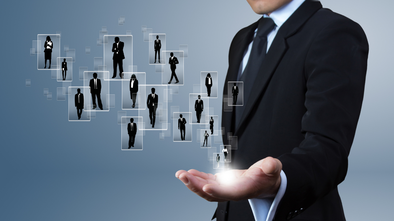 A collection of potential employees held in the hand of an employer | Scott Legal, P.C. A collection of potential employees held in the hand of an employer