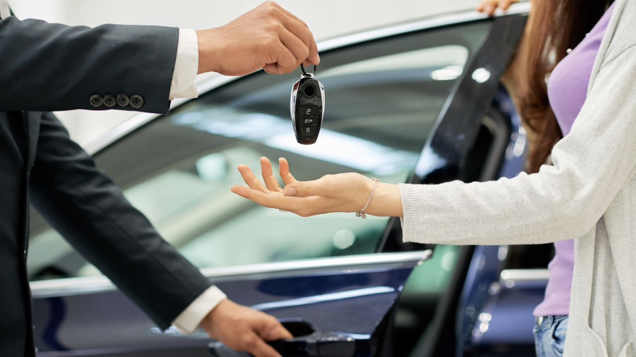 A car being bought at a car dealership | Scott Legal, P.C. A car being bought at a car dealership
