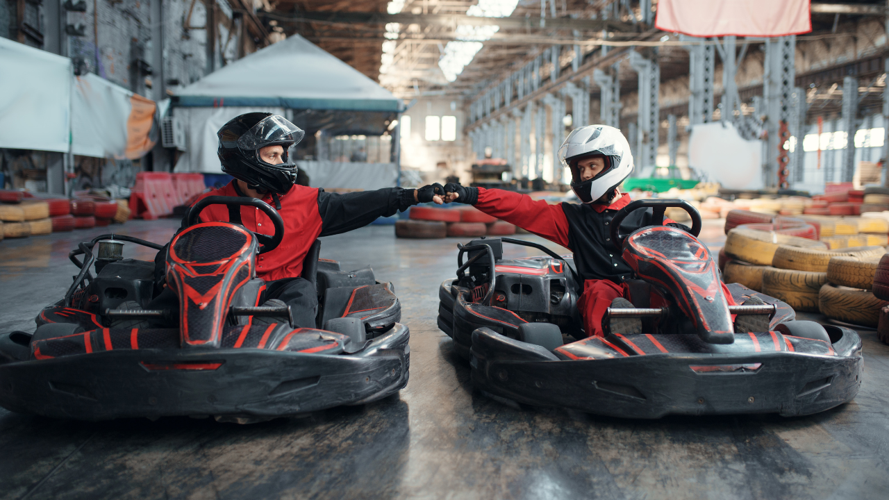 Two go-karting individuals | Scott Legal, P.C. Two go-karting individuals