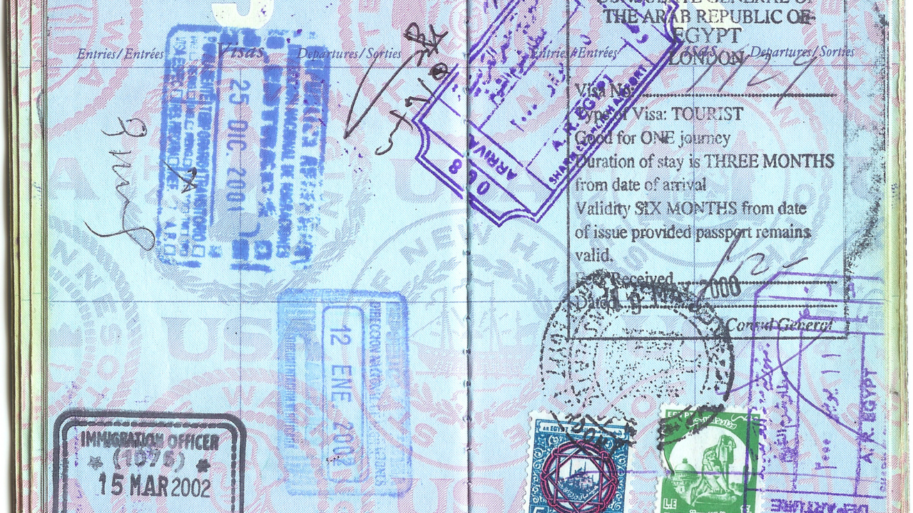 A passport full of stamps | Scott Legal, P.C. A passport full of stamps