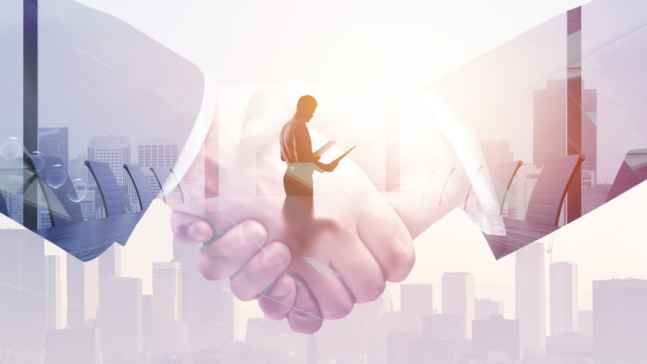 A business agreement displayed as two hands shaking in agreement | Scott Legal, P.C. A business agreement displayed as two hands shaking in agreement