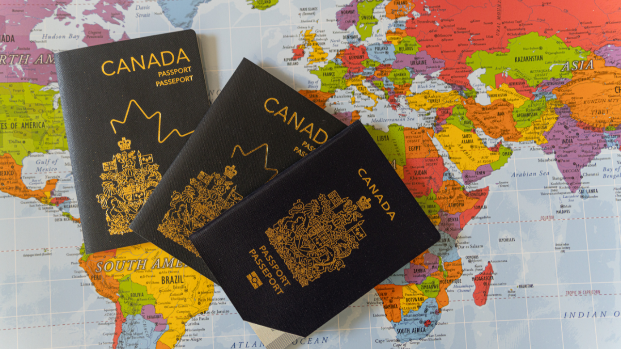 Canadian passport and world map | Scott Legal, P.C. Canadian passport and world map