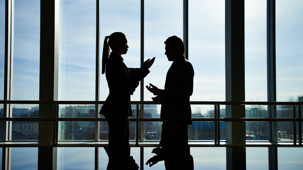 Business partners speaking | Scott Legal, P.C. Business partners speaking