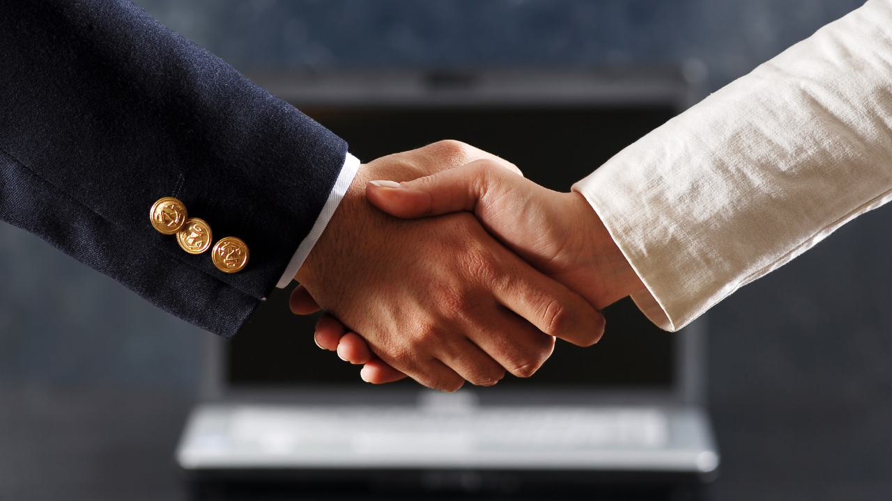 Partners shaking hands | Scott Legal, P.C. Partners shaking hands