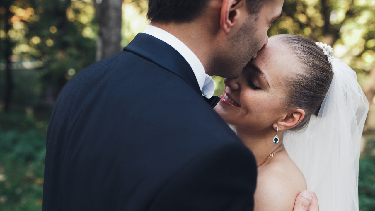 A couple at their wedding | Scott Legal, P.C. A couple at their wedding