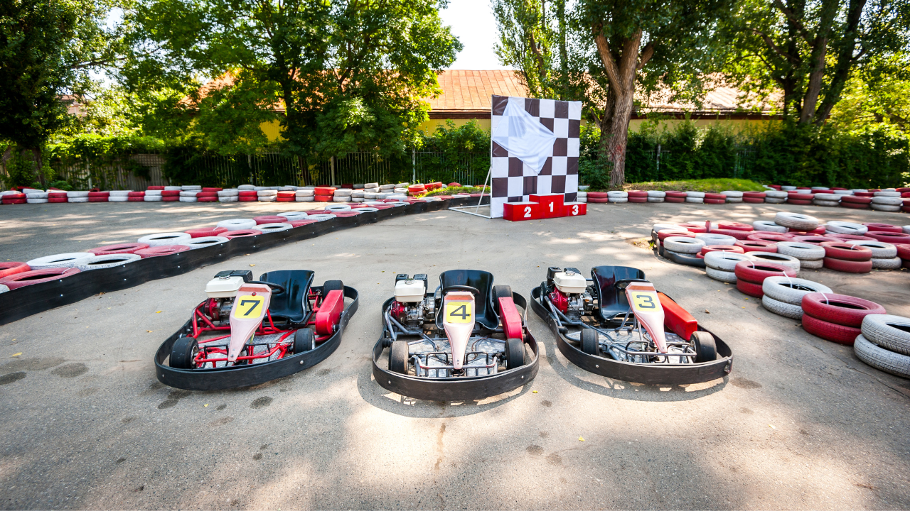 Three gokarts on a track | Scott Legal, P.C. Three gokarts on a track